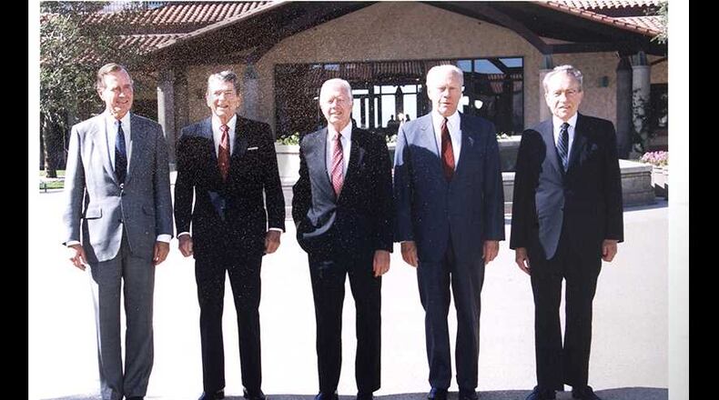 A signed photograph of five United States presidents.
