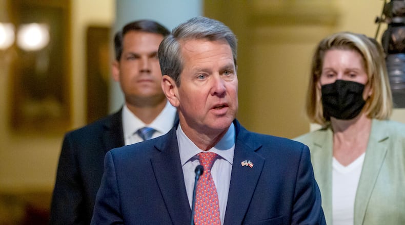 Gov. Brian Kemp talks to the press before signing HB 479, which repeals Georgia's citizen's arrest law at the State Capital Monday, May 10, 2021. STEVE SCHAEFER FOR THE ATLANTA JOURNAL-CONSTITUTION
