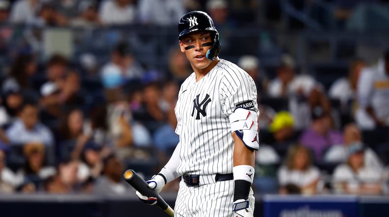 New York Yankees' Aaron Judge walks to the dugout after striking out during the sixth inning of a baseball game against the Colorado Rockies, Tuesday, Sept. 8, 2026, in New York. (AP Photo/Noah K. Murray)