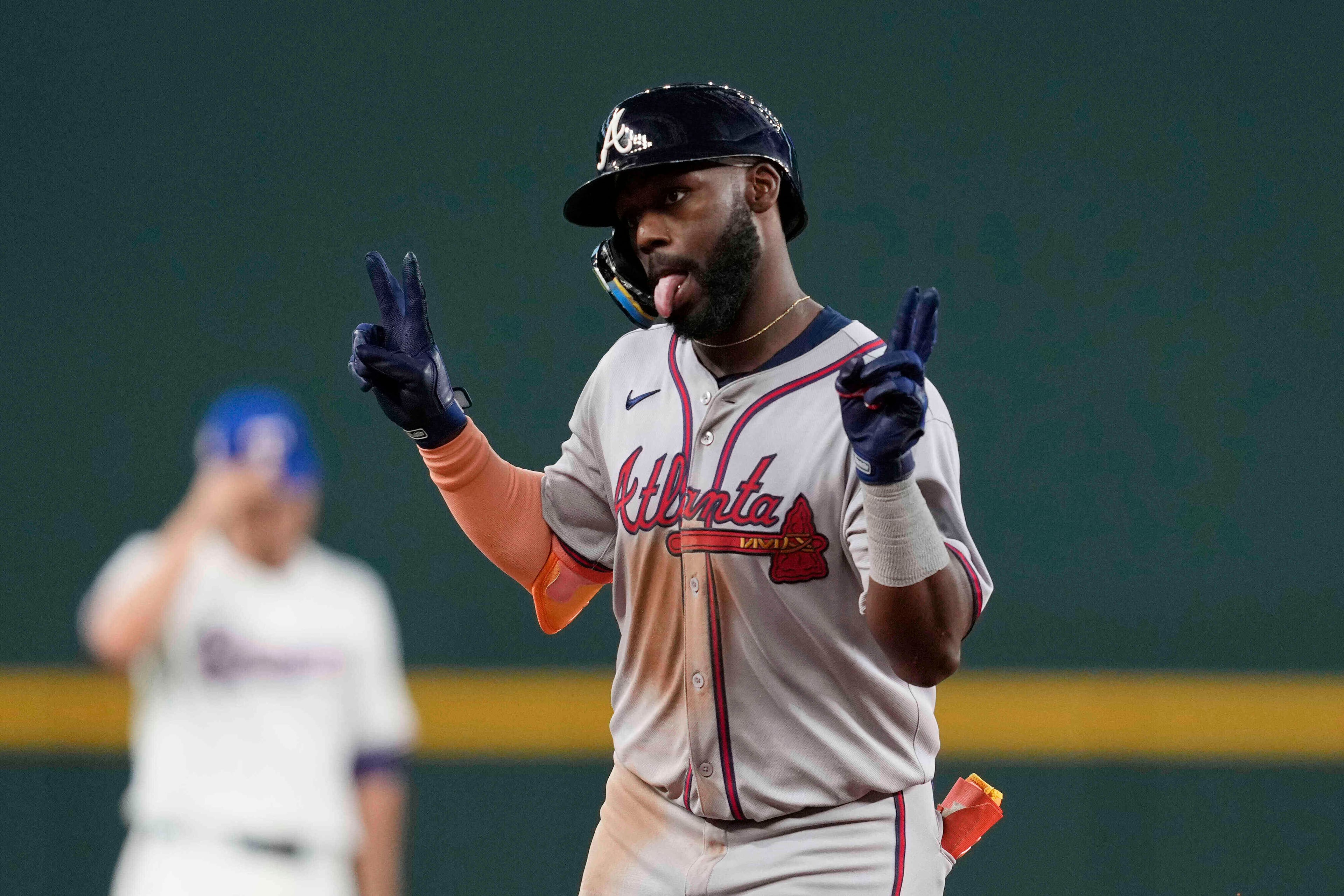 Michael Harris II celebrates after his solo home run against the Texas Rangers on Saturday, July 26, 2025, in Arlington, Texas. The Braves center fielder ended his monthslong slump by changing how high he held his bat. (Tony Gutierrez/AP)