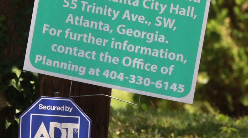 Several rezoning meeting signs were posted in the Loch Lomond neighborhood. Residents there are Atlanta residents and will vote in elections in Atlanta, though Atlanta’s annexation of their neighborhood has been challenged. BOB ANDRES / BANDRES@AJC.COM AJC File Photo