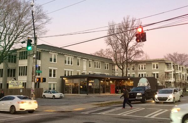 Residents in the Poncey-Highland neighborhood worry that these apartments along North and Highland avenues may one day be demolished to create a mega development there. The owner says there are no such plans. Photo by Bill Torpy