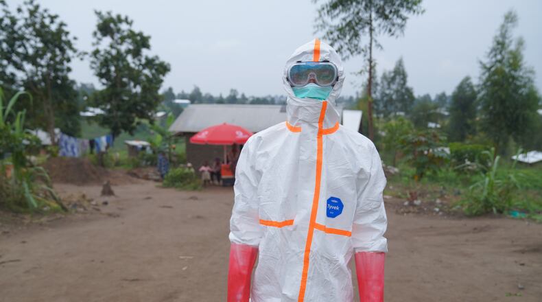 Wiza Bondele, a health worker on the prevention and control team, poses for a photograph in Ituri province, eastern Congo, Wednesday, Aug 5, 2026. (AP Photo/Dieudonne Dirole)