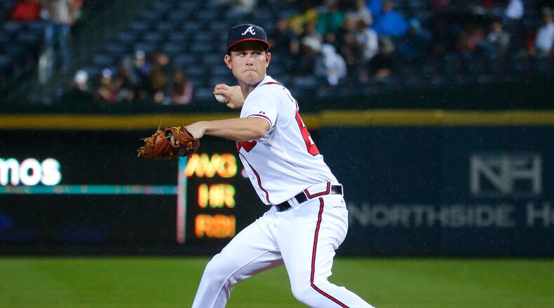 Ryan Weber #68 of the Atlanta Braves pitches in the third inning against the Washington Nationals at Turner Field on October 1, 2015 in Atlanta, Georgia. (Photo by Kevin C. Cox/Getty Images)