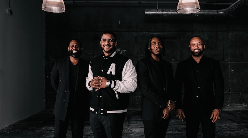 (Left to Right) Ryan Glover, Ryan Wilson, TK Petersen and Paul Judge recently announced the acquisition of The Gathering Spot by digital banking platform Greenwood.