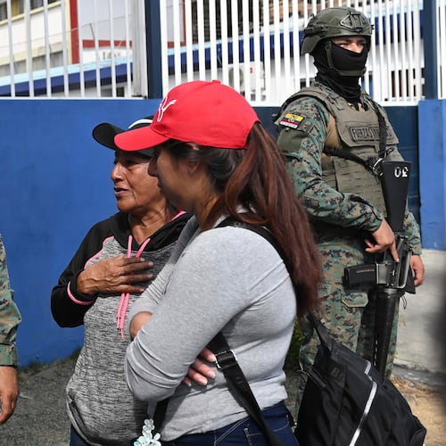 Women seek information about the expected arrival of their relatives who were aboard the Maria Candelaria, a vessel intercepted two days prior by U.S. authorities on suspicion of alleged drug trafficking, at the port in Manta, Ecuador, Monday, Sept. 7, 2026. (AP Photo/Ariel Ochoa)