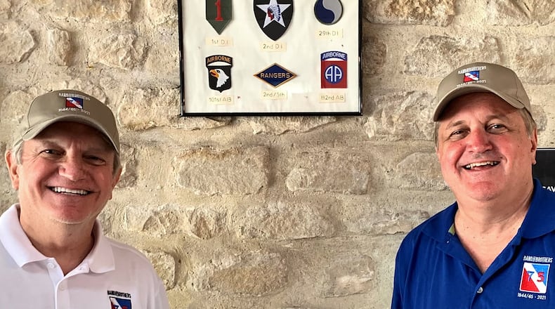 While Tom Dworschak (left) and brother Scott were on their journey retracing their father’s World War II footsteps across Europe, they also visited Normandy’s Omaha Beach, where Allied amphibious landings June 6, 1944, began the liberation of German-held France.