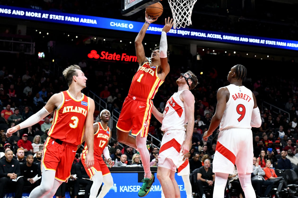 Atlanta Hawks forward Jalen Johnson (1) goes to the basket for the shot during the second half in the home opener at State Farm Arena, Thursday, October 22, 2025, in Atlanta. The Toronto Raptors won 138-118 over the Hawks. (Hyosub Shin/AJC)
