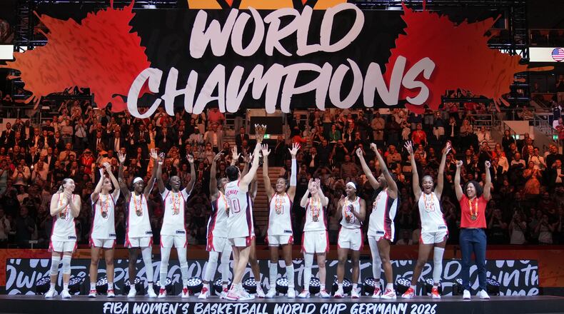 United States team stands on the podium after winning the Women's Basketball World Cup final match between the United States and France in Berlin, Sunday, Sept. 13, 2026. (AP Photo/Ebrahim Noroozi)