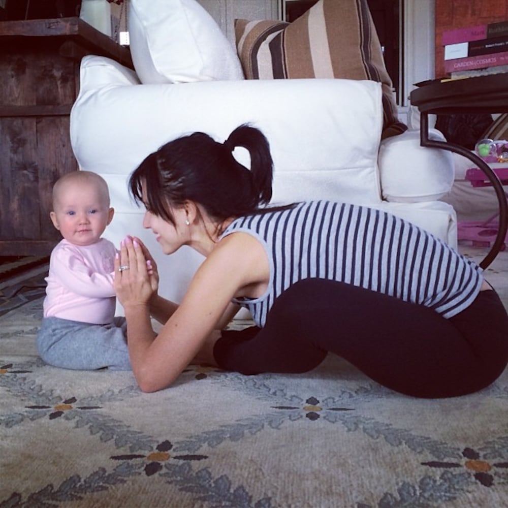 Feb. 23, 2014: Happy 6 months Carmen! #hilariaypd #yogapostureoftheday #babyyoga (baddha konasana)