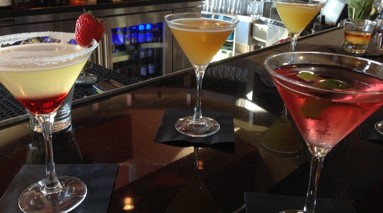 CineBistro customers can also wait for showtime at a bar and lounge outside the theaters.