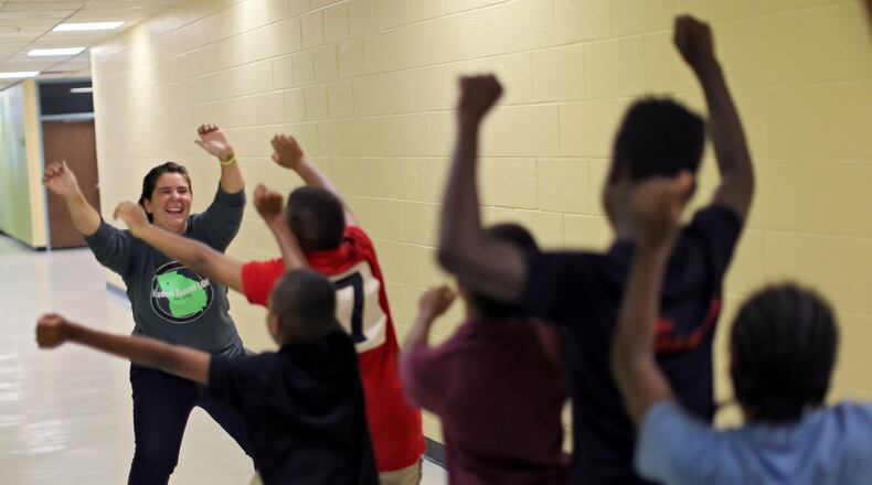 August 26, 2016 - Atlanta - Sixth grade lead teacher Laura White works with her students out in the hallway. The Kindezi School at Old Fourth Ward is part of a charter group that has been operating in Atlanta since 2010. BOB ANDRES /BANDRES@AJC.COM