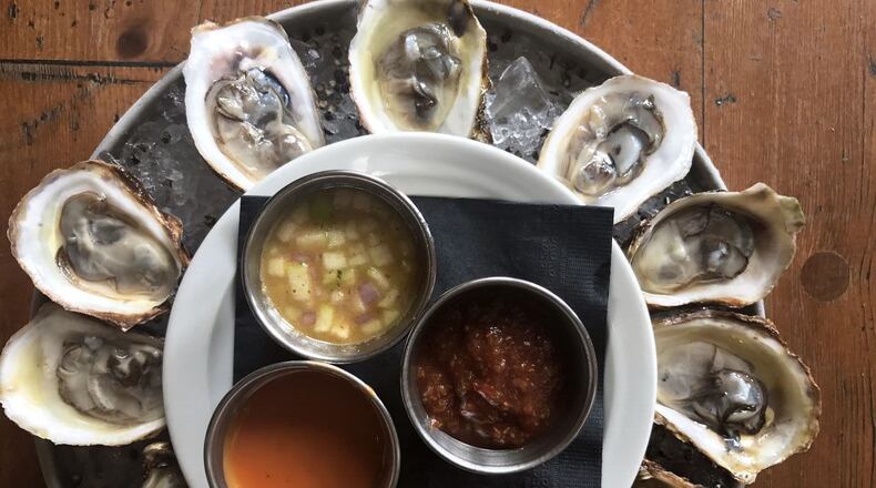 Get 50-percent off oysters and $5 drinks weekdays at Milton’s Cuisine & Cocktails. Photo credit: Melissa Libby & Associates.