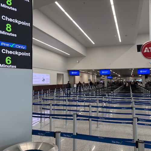 The wait in south checkpoint's security lines isn't long at all early Sunday afternoon at Hartsfield-Jackson Atlanta International Airport. (David Aaro/AJC)