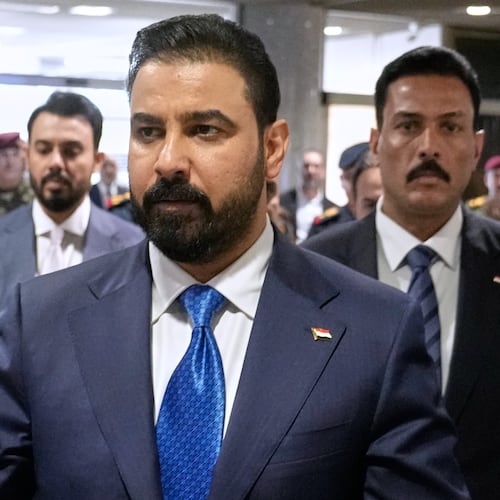 FILE - Iraq's Prime Minister-designate Ali al-Zaidi arrives at the Iraqi parliament to attend the voting of his government in Baghdad, Iraq, May 14, 2026. (AP Photo/Hadi Mizban, File)