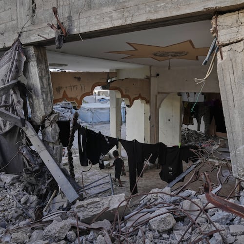 Displaced Palestinians shelter inside a building heavily damaged during the Israel-Hamas war in Gaza City, Thursday, Sept. 17, 2026. (AP Photo/Jehad Alshrafi)