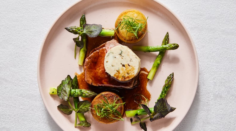 The French-inspired menu at Brasserie Margot at Four Seasons Hotel Atlanta features dishes including swordfish Milanese, steak frites, bouillabaisse, foie gras, beef tartare and salade nicoise. (Courtesy of Kathryn McCrary)