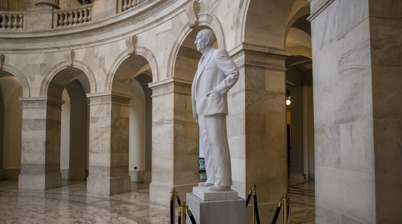 A statue of U.S. Sen. Richard Russell of Georgia stands in the rotunda of a Senate office building named after him. After the death of U.S. Sen. John McCain of Arizona this weekend, Senate Democratic leader Chuck Schumer said he will introduce a resolution to rename the Russell Senate Office Building to honor McCain. (AP Photo/J. Scott Applewhite)