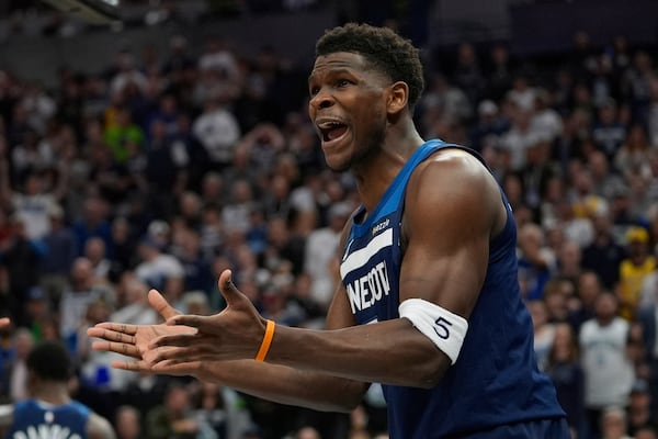 Minnesota Timberwolves guard Anthony Edwards reacts toward a referee during the first half of Game 3 of an NBA basketball first-round playoff series against the Los Angeles Lakers, Friday, April 25, 2025, in Minneapolis. (AP Photo/Abbie Parr)