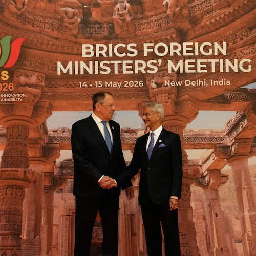 India's Foreign Minister S.Jaishankar, right, shakes hands with Russia's Foreign Minister Sergey Lavrov as he arrives for a two-day BRICS nations meeting in New Delhi, India, Thursday, May 14, 2026. (AP Photo/Manish Swarup)