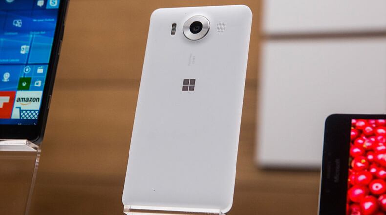 A new phone titled the Microsfot Lumia 950 sit on display at a media event for new Microsoft products on October 6, 2015 in New York City. (Photo by Andrew Burton/Getty Images)
