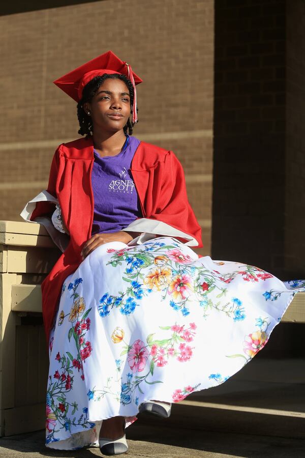 Hannah Savage poses for a portrait on Tuesday, June 16, 2020, at Whitewater High School in Fayetteville, Georgia. Thousands of K-12 schools and colleges closed in the middle of the spring semester this year due to the coronavirus pandemic. For high school and college seniors, the closure not only meant the end of in-person classes, but also no traditional senior rituals like prom and graduation. 