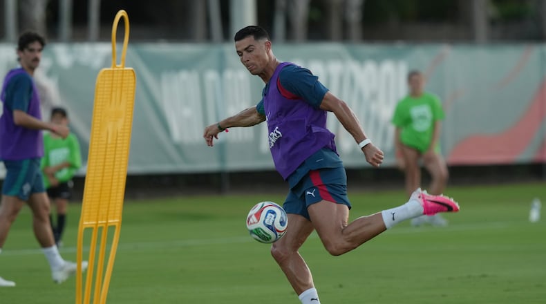 Portugal's Cristiano Ronaldo runs drills during the men's national soccer team training session ahead of their FIFA World Cup soccer tournament Saturday, June 13, 2026, in Palm Beach Gardens, Fla. (AP Photo/Marta Lavandier)
