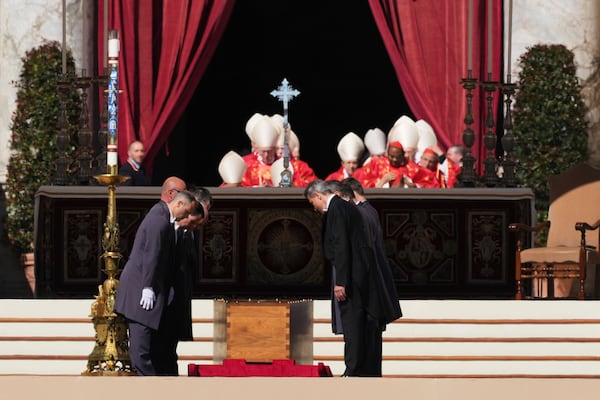 The coffin of Pope Francis is placed on the ground in St Peter's Square for his funeral, at the Vatican, Saturday, April 26, 2025. (AP Photo/Andrew Medichini)