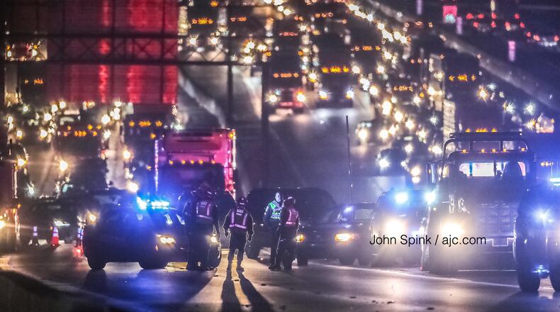 DeKalb County police told AJC.com a pedestrian was hit by at least one vehicle and died at the scene.