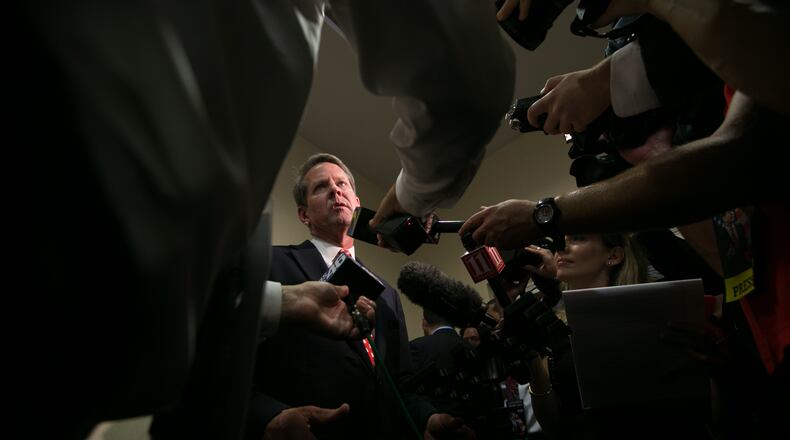 Secretary of State Brian Kemp with reporters after his victory in July’s GOP primary runoff for governor. Jessica McGowan/Getty Images