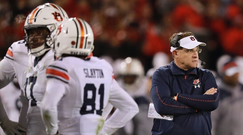 Auburn head coach Guz Malzahn looks on during a time out against Georgia during a 27-10 loss Saturday, Nov. 10, 2018, in Athens.