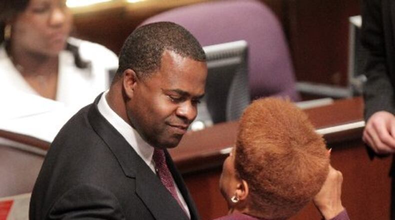 Atlanta Mayor Kasim Reed with councilwoman Cleta Winslow, who was one of seven council members to receive campaign contributions from the mayor’s ballot committee, Citizens For Better Transportation 2016.