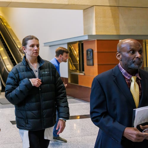 FILE - Aimee Bock, founder and executive director of the nonprofit organization Feeding Our Future, arrives at the Minneapolis federal courthouse with her attorney, Ken Udoibok, right, on March 19, 2025, in Minneapolis. (Kerem Yücel/Minnesota Public Radio via AP, File)