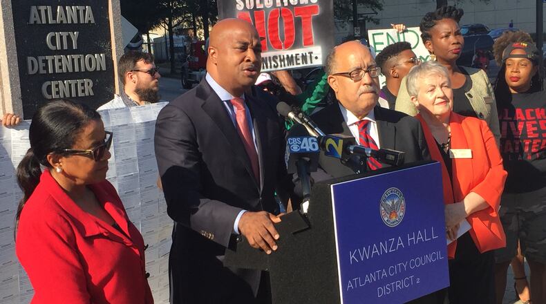 Atlanta City Councilman and mayoral candidate Kwanza Hall leads a rally Friday focused on changing possession laws for small amounts of marijuana.