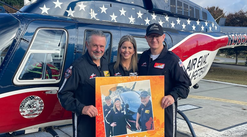 Air Evac Lifeteam No. 117 received Piedmont Eastside’s First Friday Heroes Award for their role in the Sept. 4 shooting at Apalachee High School. The awards went to pilot Matthew Dine (right), flight nurse Lindsay Chapman and flight nurse and paramedic John "Trey" Phillips.