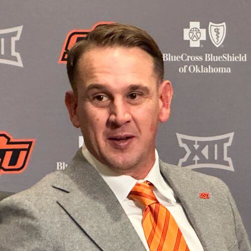 FILE - Eric Morris attends a news conference introducing him as the new head coach of the Oklahoma State NCAA college football team, Dec. 8, 2025 in Stillwater, Okla.(AP Photo/Cliff Brunt, File)