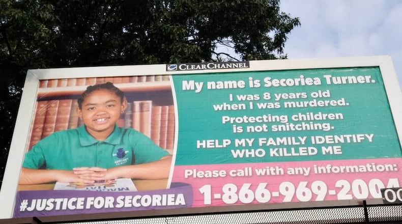 The family of Secoriea Turner put up two billboards along University Avenue where she was killed on July 4. They're asking anyone with information on her death to come forward.