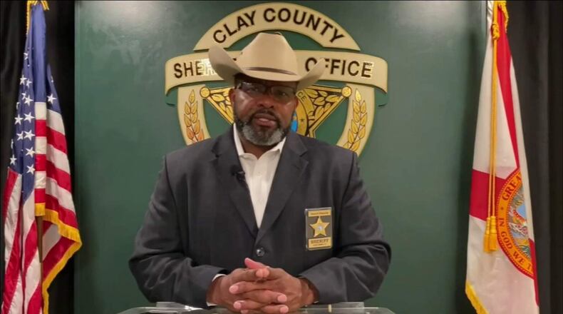 Clay County Sheriff Darryl Daniels surrendered to authorities Thursday at the Jacksonville jail and was booked on one felony charge of tampering with evidence and three misdemeanor counts of giving false information to law enforcement. The arrest happened only days away from Daniels' reelection primary.