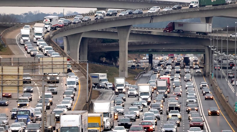 Traffic travels northbound on I-85 just past the I-285 overpass, also known as Spaghetti Junction, earlier this year. (File photo by Jason Getz / Jason.Getz@ajc.com)