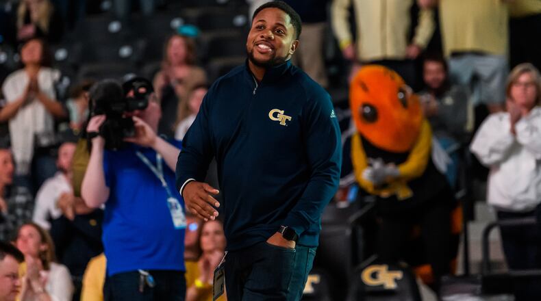 Georgia Tech great Tashard Choice was introduced to the crowd at McCamish Pavilion at halftime of the men's basketball team's game against Wake Forest on Saturday. (Danny Karnik/Georgia Tech Athletics)