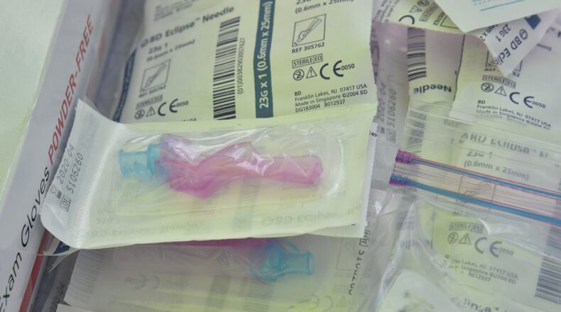 A container of needles during the 2nd Annual Drive-Thru Flu Shot Clinic at parking lots of Northlake Mall in September 2018.