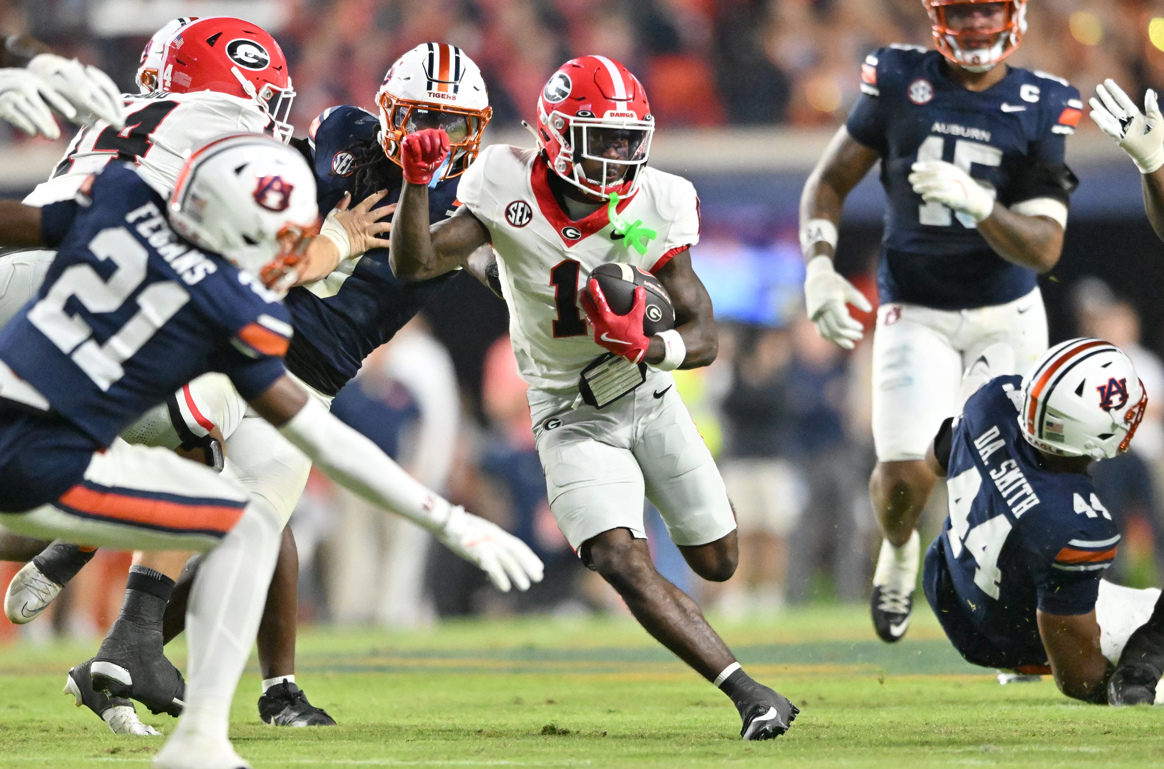 Georgia wide receiver Zachariah Branch (1) runs the ball during the second half in a NCAA college football game at Jordan-Hare Stadium, Saturday, October 11, 2025, in Auburn, Ala. Georgia won 20-10 overAuburn. (Hyosub Shin / AJC)