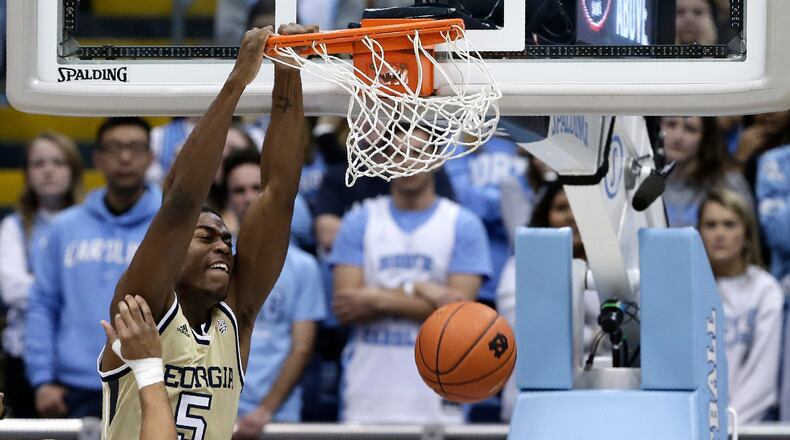 Georgia Tech forward Moses Wright (5) dunks against North Carolina during the first half of an NCAA college basketball game in Chapel Hill, N.C., Saturday, Jan. 4, 2020. (AP Photo/Gerry Broome)