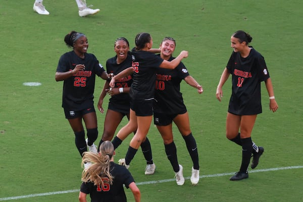 Georgia midfielder Ava Stack (second from right) celebrates her goal with teammates during their “Soccer in Sanford” game against James Madison on Thursday, Aug. 20, 2026, in Athens. (Jason Getz/AJC)