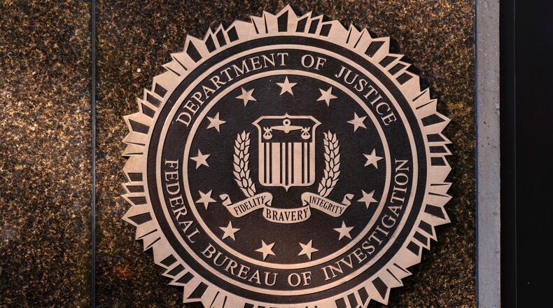 FILE - The seal of the Federal Bureau of Investigation is displayed at its headquarters in Washington, Nov. 18, 2024. (AP Photo/Jose Luis Magana, File)