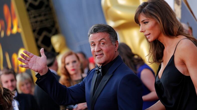Sylvester Stallone and wife Jennifer Flavin arrive at the 88th Academy Awards on February 28, 2016, at the Dolby Theatre in Hollywood. (Jay L. Clendenin/Los Angeles Times/TNS)