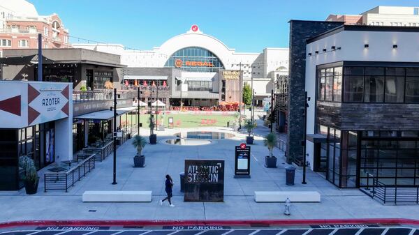 An aerial image shows one of the access points to the main square at Atlantic Station on Thursday, Oct. 16, 2025. The shopping district is celebrating twenty years of commitment to hospitality and entertainment, an area that has significantly shaped the local landscape. (Miguel Martinez/AJC)