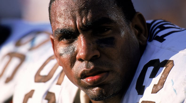 John Thierry played for the Bears, Browns, Falcons and Packers.