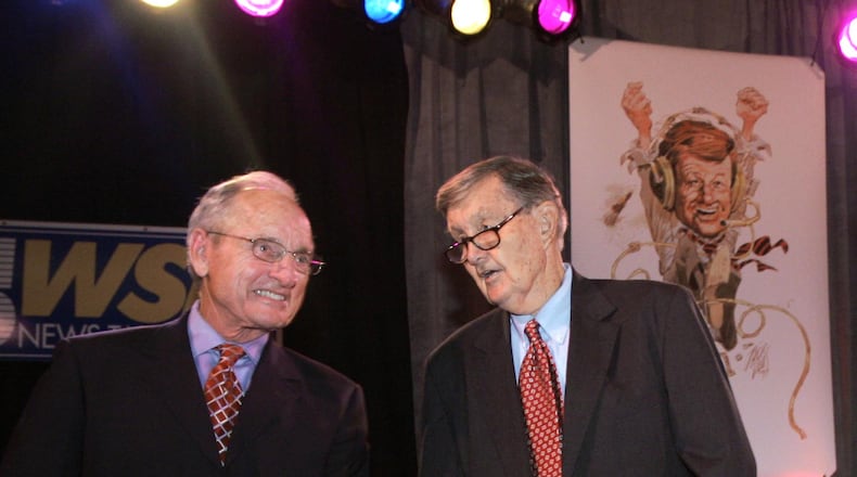 Broadcaster Larry Munson (right) with former Georgia coach Vince Dooley in 2006. (File photo/John Amis)