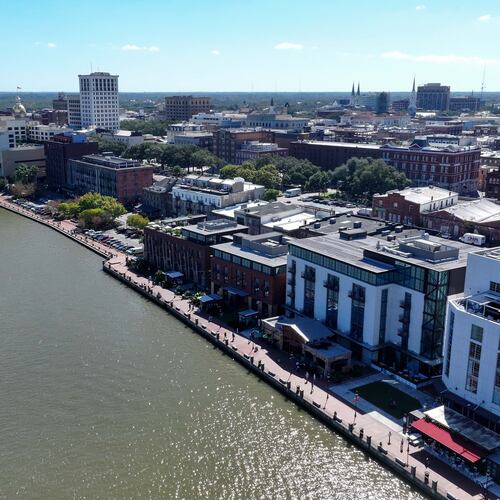 In this aerial image, the Plant Riverside District along the Savannah Riverwalk is visible. Earlier this year, U.S. Rep. Buddy Carter celebrated the $4.2 million he obtained in a funding bill to complete a Riverwalk restoration project adjacent to the Savannah Convention Center. (Miguel Martinez/AJC 2024)
(Miguel Martinez / AJC)